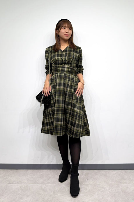 A classic outfit featuring a plaid pattern
